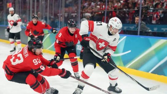 Swtizerland's Kevin Fiala Stretchered Off Ice (featured)